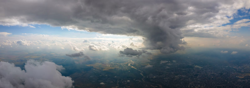 Cumulus clouds forming before rainstorm.