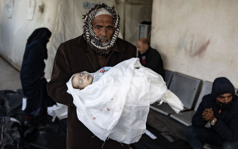 Gaza officials publish list of those killed in Israeli assault. The first 14 pages are babies
