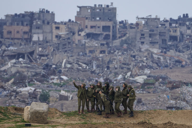 Israeli female soldiers celebrate the death of 12,300 children